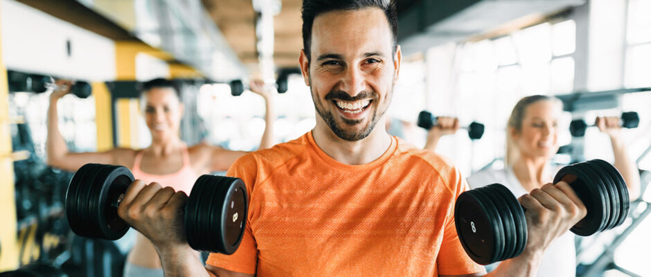 Man training with dumbells