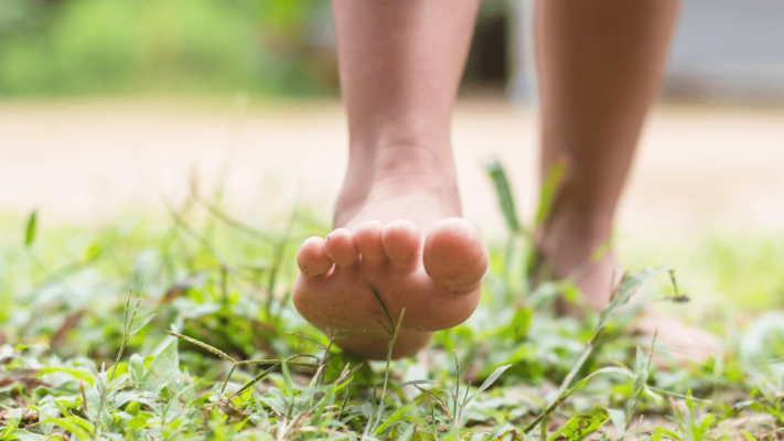 Walking barefoot on the grass