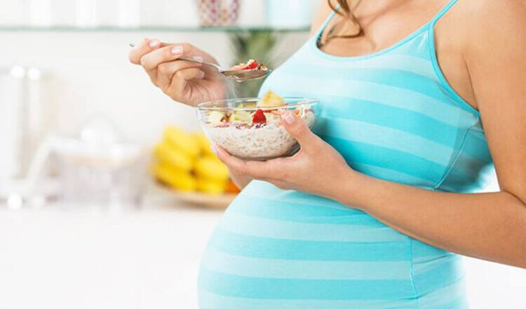 Pregnant woman eating