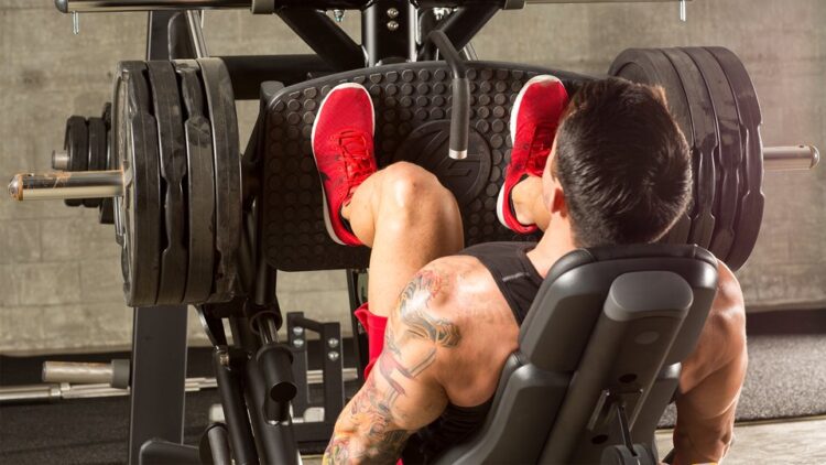 Guy on leg press machine